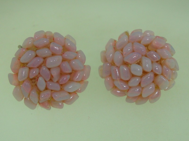 Vintage iridescent pink glass bead earrings with clip-on backs.