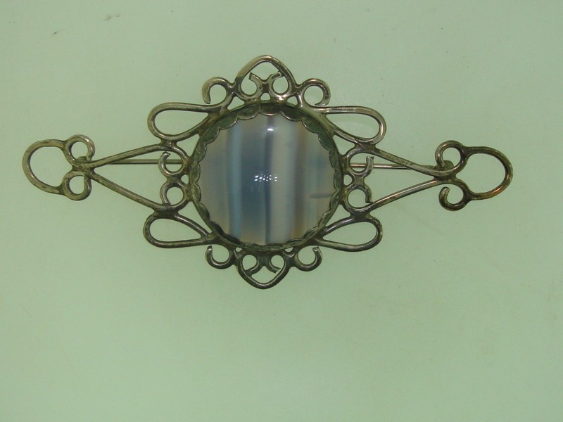 Artisan sterling silver filigree pin with purple and white agate cabochon