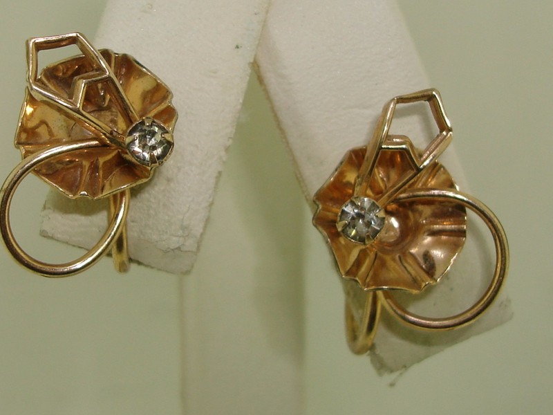 Pair of vintage 1940s gold-filled rhinestone earrings with a sparkly petal design