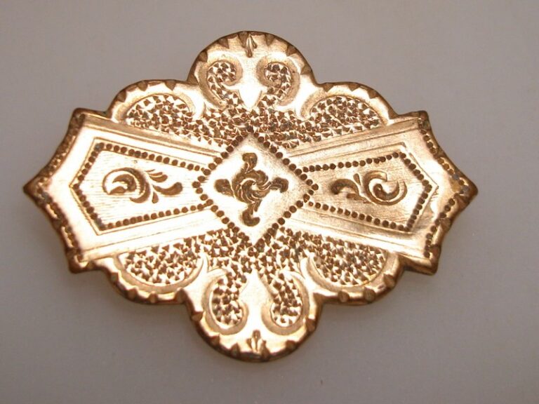 Antique Etruscan gold-washed watch pin with repoussé design and shepherd's hook clasp