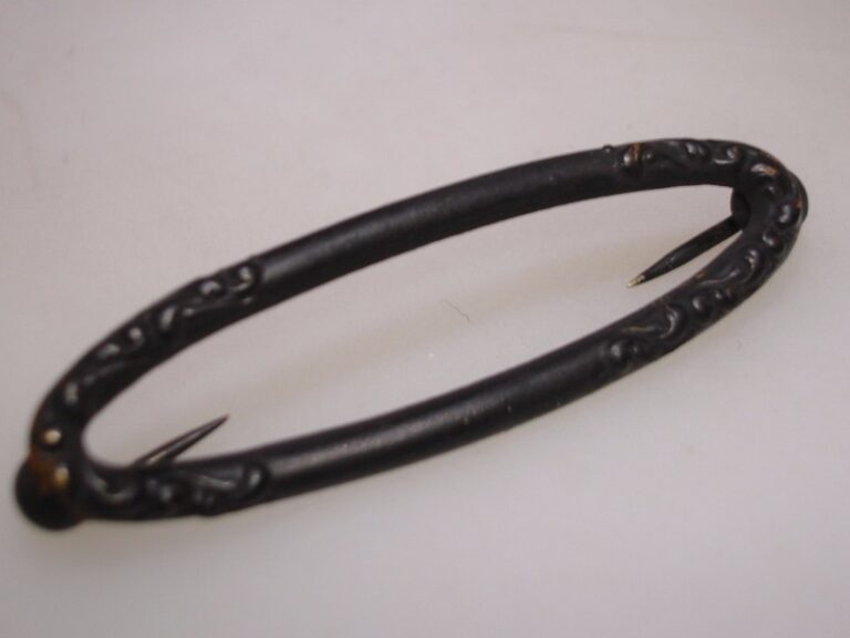 Antique Edwardian mourning collar pin, black metal, repousse design