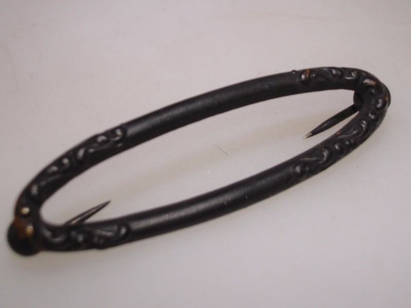 Antique Edwardian mourning collar pin, black metal, repousse design