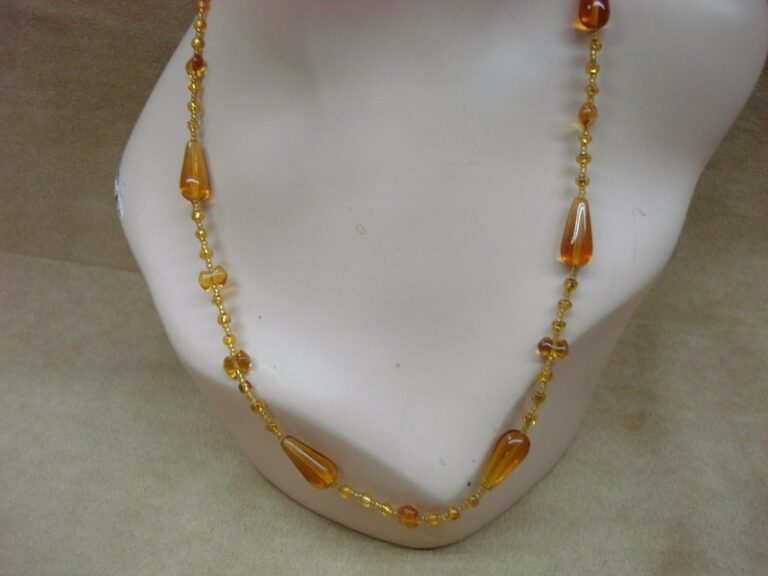 Vintage 1960s amber glass bead necklace with tear drop, peanut, and bugle beads