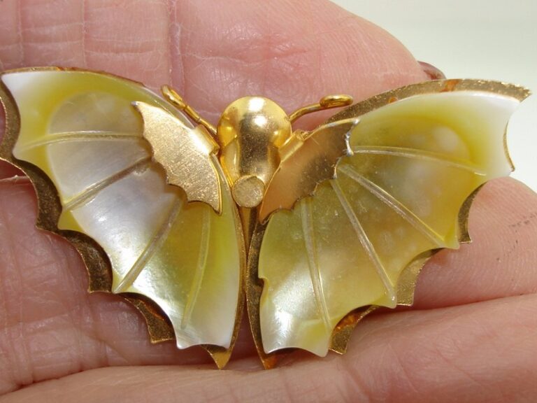 Vintage 1960s carved mother-of-pearl butterfly wing pin, gold tone