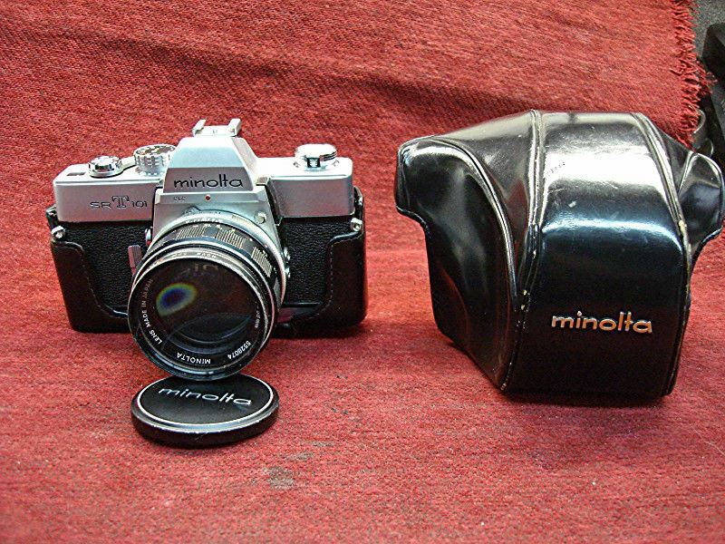 Vintage MINOLTA SRT101 35mm camera with Rokkor-PF 58mm lens and case, restoration project