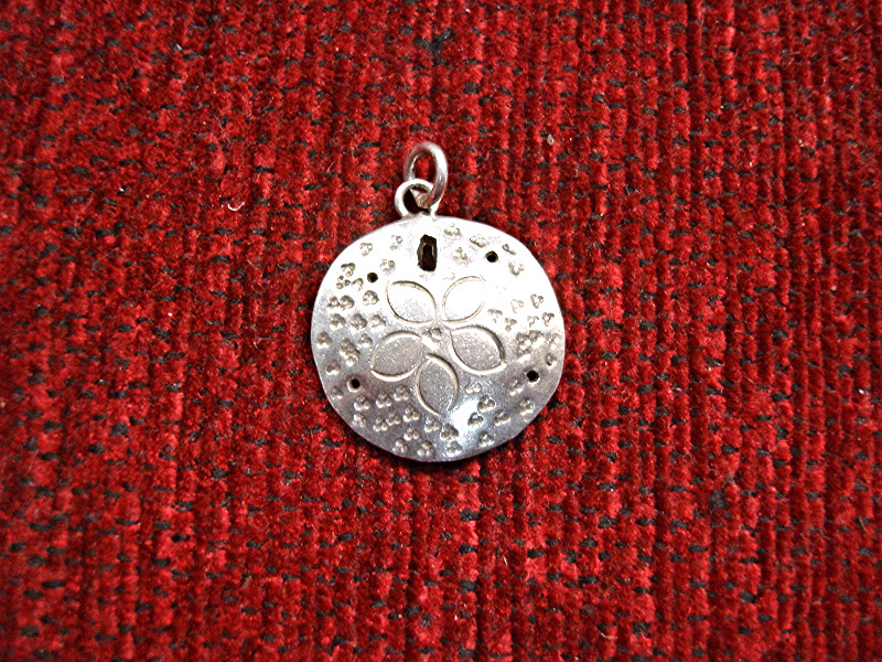 Vintage sterling silver sand dollar charm by Lawton