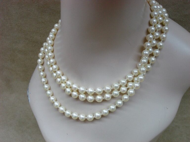 Elegant 52 inch creamy faux pearl opera length necklace
