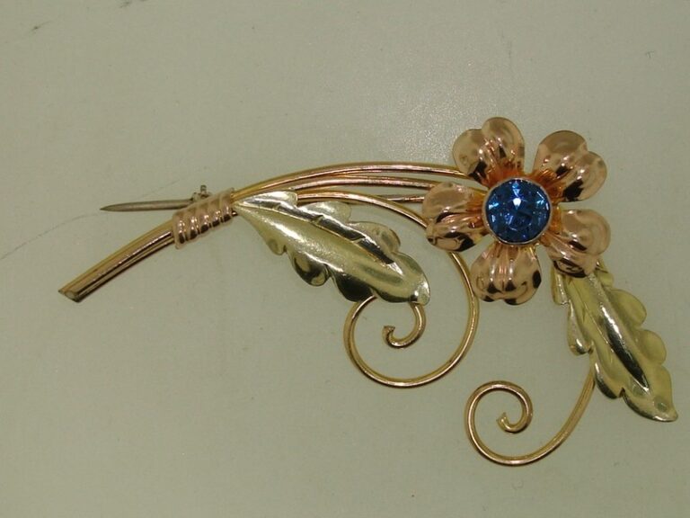 Vintage Van Dell tri-color gold filled flower pin with blue rhinestone accent