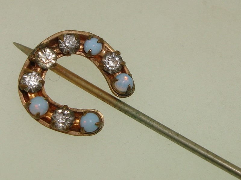 Antique Victorian gold-washed horseshoe stick pin with brilliants and opal glass