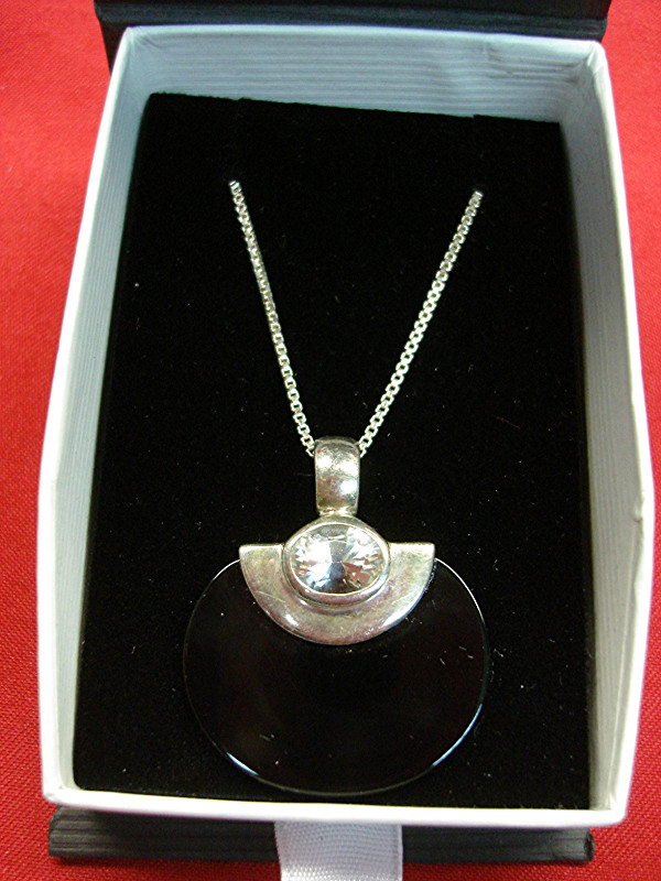 Sterling silver onyx and white topaz pendant necklace