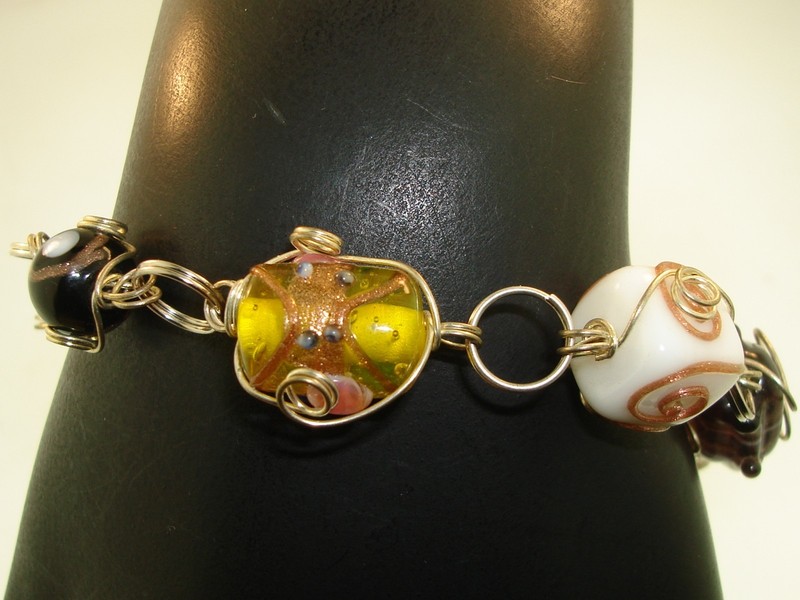 Hand-blown art glass toggle bracelet with foil wedding cake beads