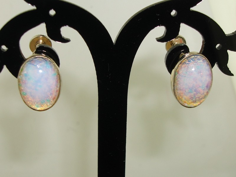 Pair of vintage 1960s faux opal glass earrings with gold-tone metal and foiled backs