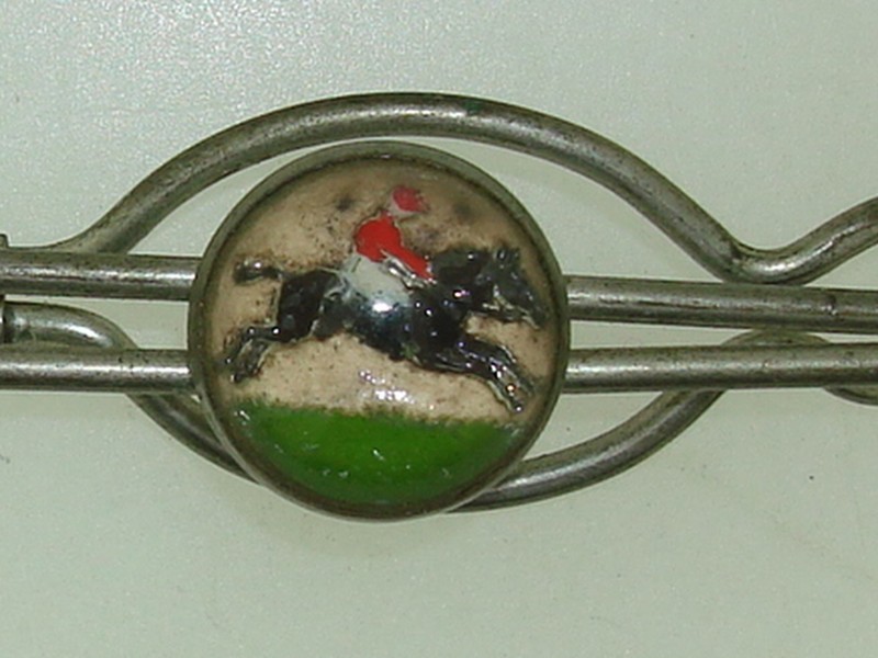 Vintage 1940s silver-tone intaglio tie bar featuring a steeplechase horse and rider