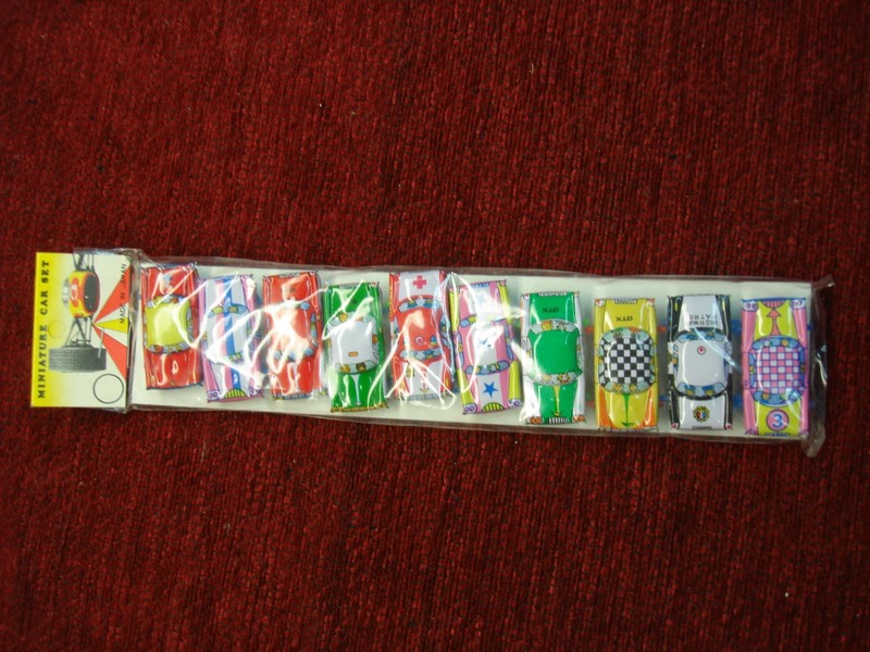 Vintage set of 10 miniature tin litho cars from the 1950s in original packaging
