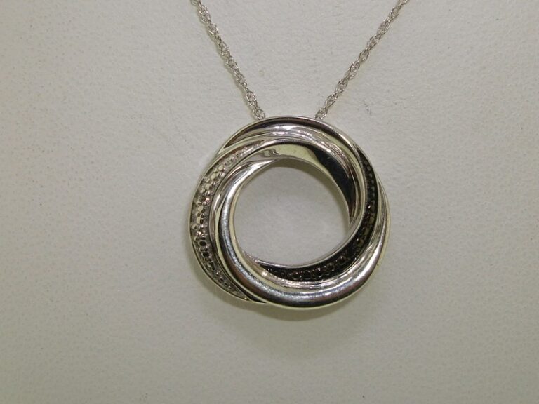 Sterling silver pendant necklace with black and white diamonds
