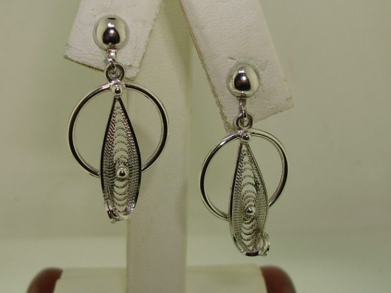 Vintage spun sterling silver dangle earrings with a delicate leaf design