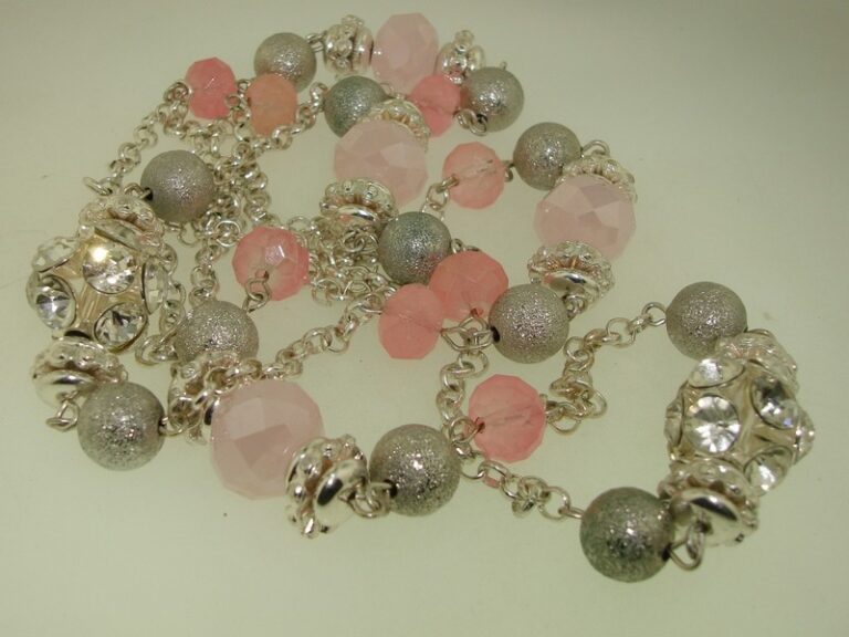 Glamorous foiled rhinestone and rose glass bead necklace on a 42-inch silver-tone chain
