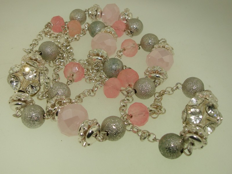 Glamorous foiled rhinestone and rose glass bead necklace on a 42-inch silver-tone chain