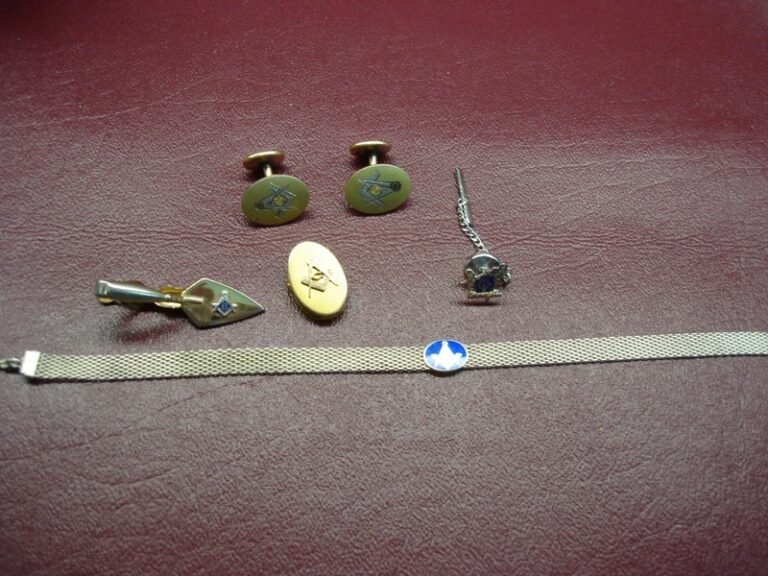 Vintage Masonic cufflinks, tie clip, lapel pin, and bracelet set