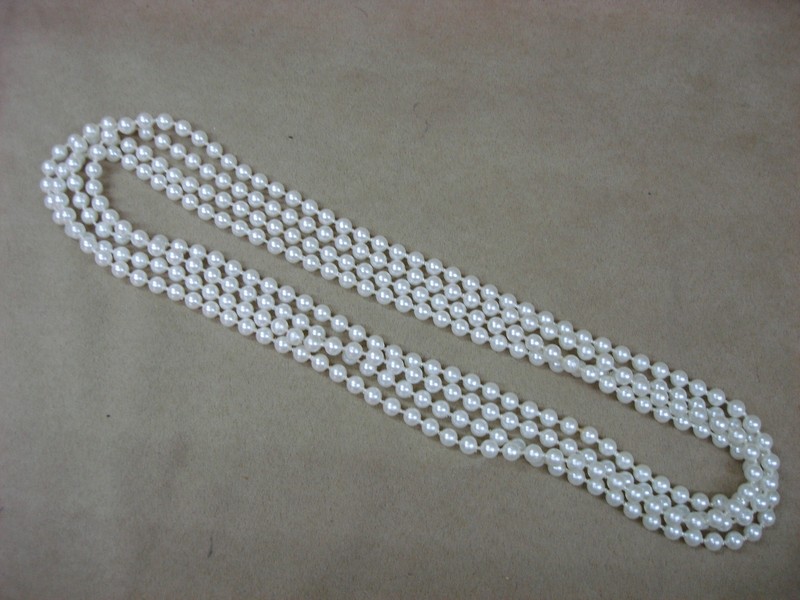 Vintage 1960s-70s creamy white faux pearl necklace, 120 inches long