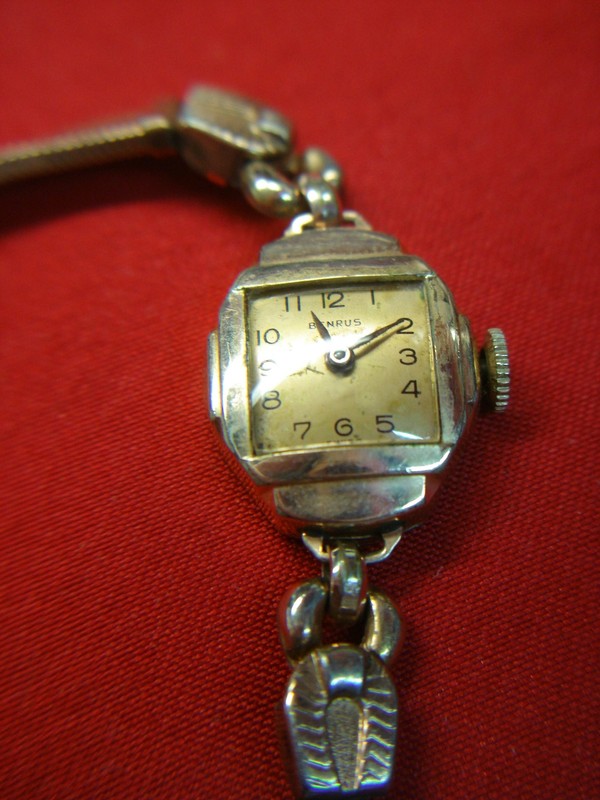 Vintage Benrus ladies wristwatch with rose gold filled case and stainless steel back