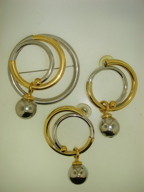 Vintage 1980s gold and silver tone large circular pin and earrings set