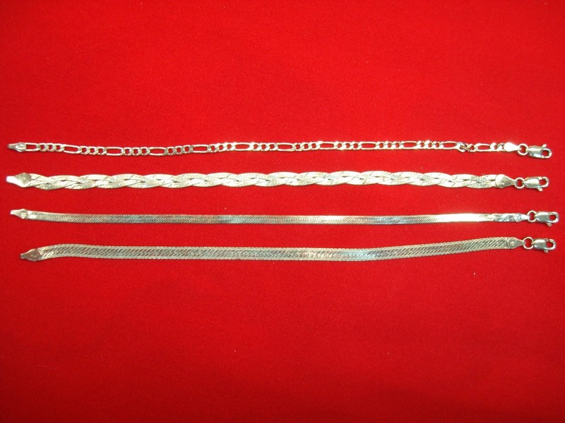 Set of four unique sterling silver bracelets, excellent condition