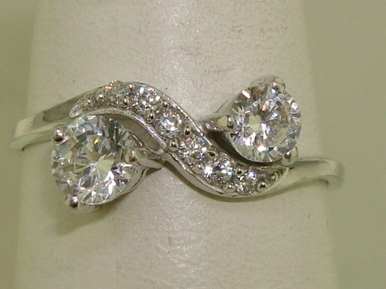 Sterling silver ring with CZ stones, size 6 3/4