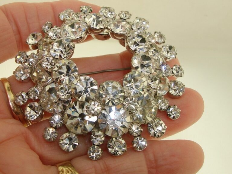 Vintage silver-tone pin with foiled rhinestones