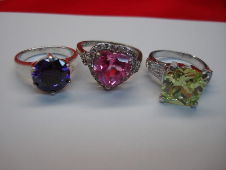 Set of 3 unique sterling silver rings with peridot, pink ice, and amethyst gemstones