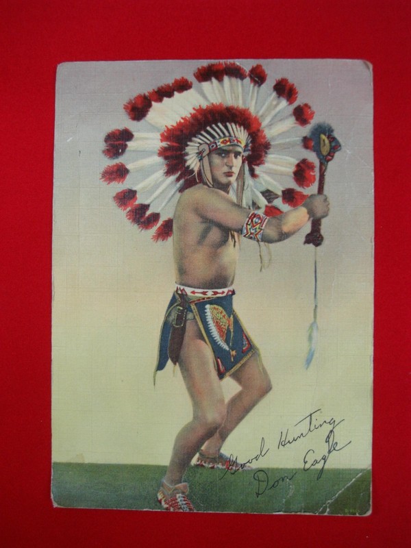 Vintage colorized linen photo card of wrestler Don Eagle, signed "Good Hunting" dated 1940s