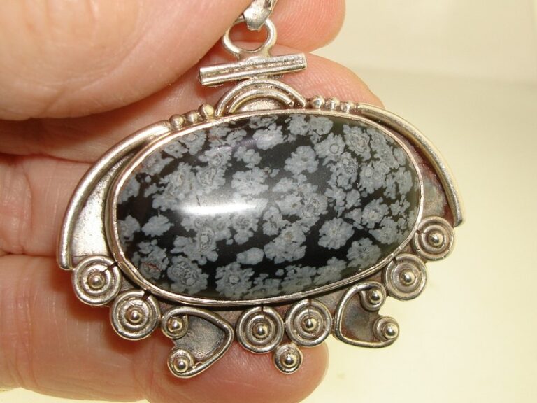 Artisan sterling silver and snowflake obsidian pendant with intricate beadwork and swirls