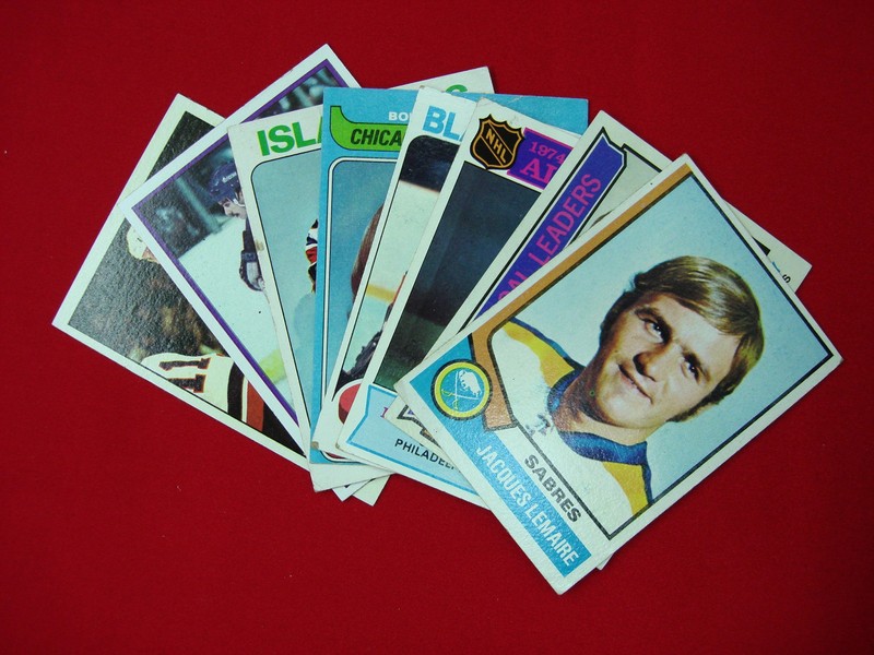 Vintage Topps hockey cards from the 1970s featuring Bobby Hull, Bobby Clarke, Tony Esposito, and more.