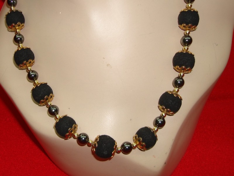 Handmade hematite and lava rock necklace with gold-tone filigree beads