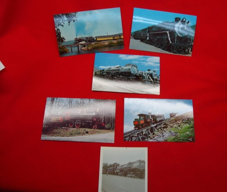 Set of vintage steam engine postcards including Steamtown, Stone Mountain, and Mount Washington Cog Railway, plus a photo of the Union Pacific Big Boy steam engine