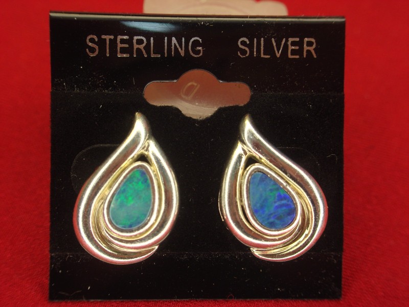 Sterling silver stud earrings with blue opals