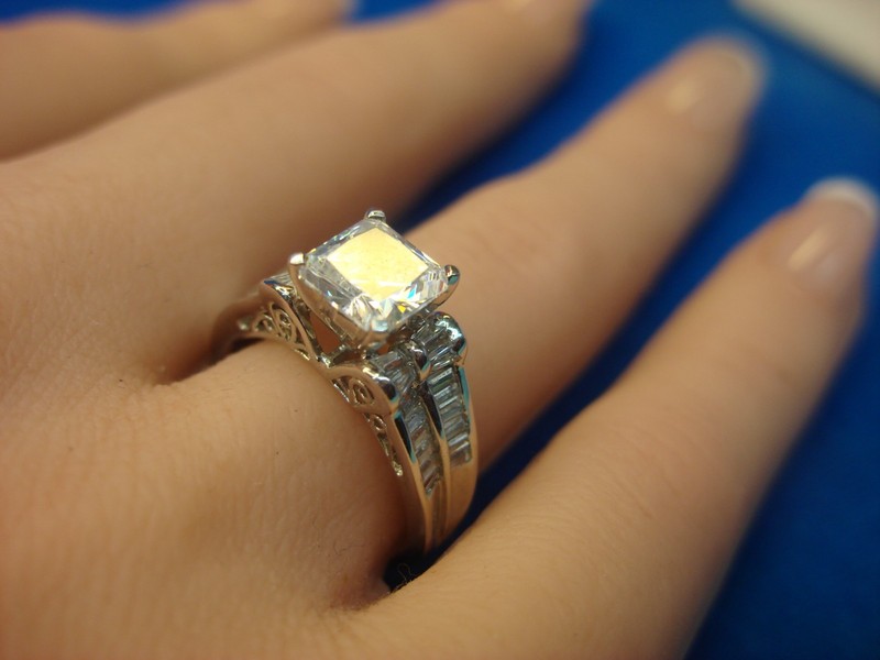 Sterling silver cocktail ring with simulant diamonds, princess cut design, size 7