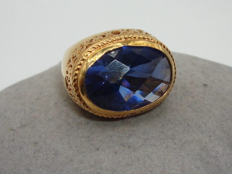 Gold plated sterling silver statement ring with blue glass stone, size 6.25