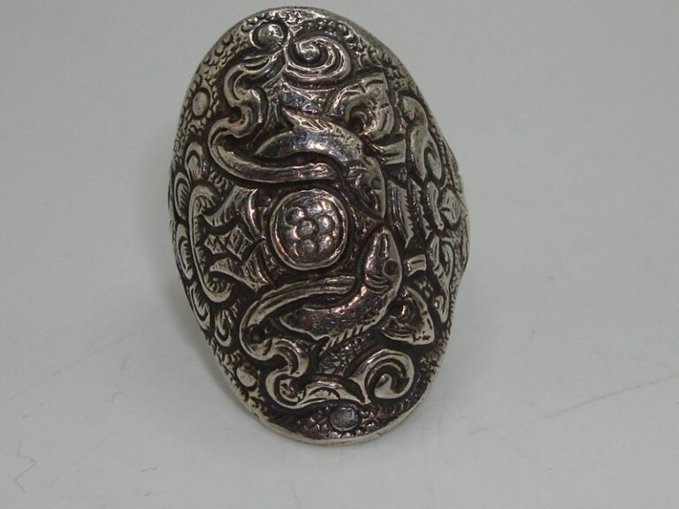 Vintage sterling silver ring with floral and fish designs, size 8.5