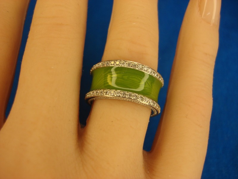 Sterling silver band ring with simulated diamonds and olive green enamel, size 6