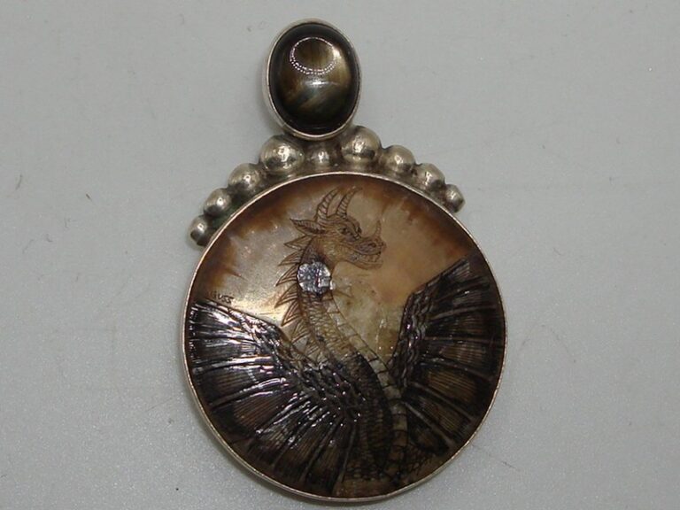 Vintage Cathy Guss sterling silver fossil dragon pendant with tiger's eye