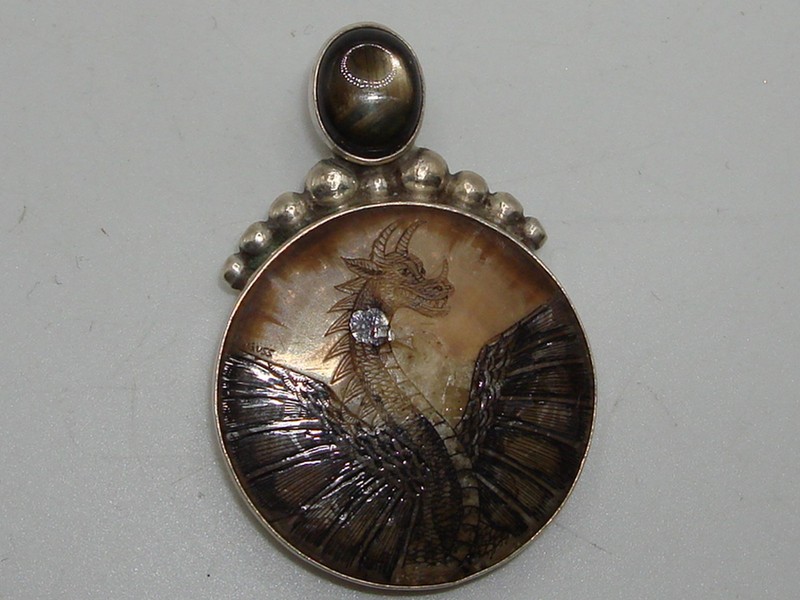 Vintage Cathy Guss sterling silver fossil dragon pendant with tiger's eye