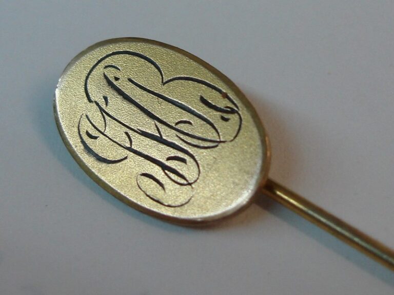 Antique gold-plated initial stick pin engraved with JHB