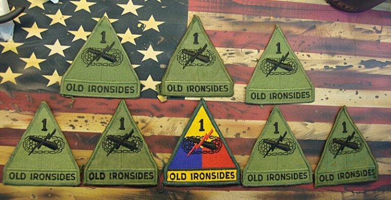 Set of 8 vintage U.S. Army 1st Armored Division shoulder insignia