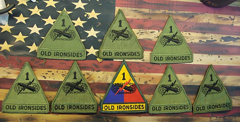Set of 8 vintage U.S. Army 1st Armored Division shoulder insignia