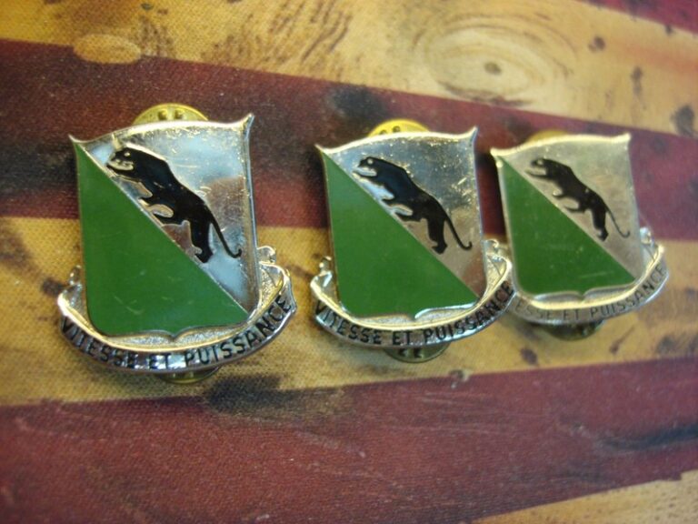 Set of three vintage U.S. Army 69th Armored Regiment collar pins