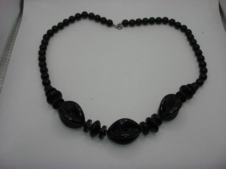Vintage black lucite boho necklace with 9.2mm beads, statement disc beads, and four-panel beads.