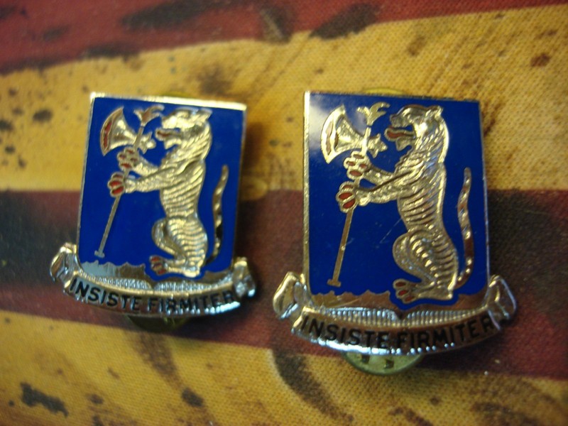 Pair of vintage U.S. Army 77th Armored Regiment collar pins with 'INSISTE FIRMITER' motto