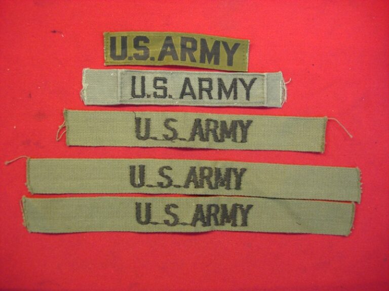 Lot of 5 vintage US Army patch tabs, including new and used condition