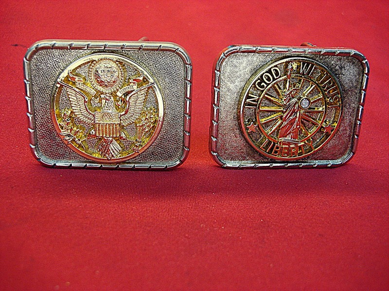 Two small western style gold and silver belt buckles